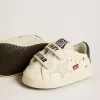 Baby School en piel napa con estampado musical y estrella de ante blanco