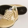 Ball Star en cristales Swarovski dorados con estrella de cuero blanco lechoso Ball Star en cristales Swarovski dorados con estrella de cuero blanco lechoso