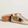 Ball Star en nubuck y napa beige con estrella de cristal Swarovski negro Ball Star en nubuck y napa beige con estrella de cristal Swarovski negro