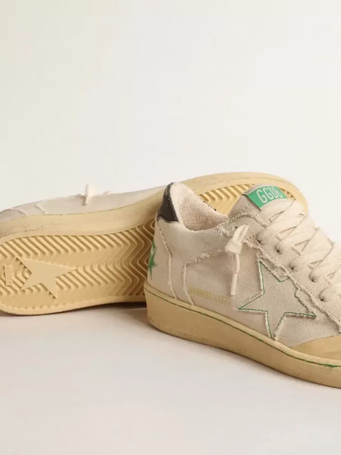 Ball Star LTD con estrella de lona color vainilla y lengüeta de cuero en el talón