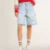 Bermudas de mujer en denim con efecto desgastado Bermudas de mujer en denim con efecto desgastado