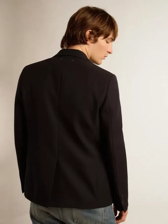 Blazer de hombre de una sola botonadura en gabardina de lana azul oscuro Blazer de hombre de una sola botonadura en gabardina de lana azul oscuro