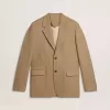 Blazer de hombre de una sola botonadura en mezcla de lino con diseño chevron en color arena. Blazer de hombre de una sola botonadura en mezcla de lino con diseño chevron en color arena.