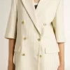Blazer de mujer en mezcla de lana a rayas blancas y grises con mangas cortas. Blazer de mujer en mezcla de lana a rayas blancas y grises con mangas cortas.
