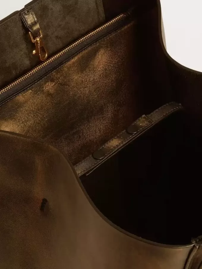 Bolso 24/7 North South en piel envejecida negra con asas ajustables