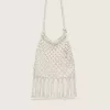 Bolso de macramé para mujer en algodón color mantequilla con un charm de langosta de cuero Bolso de macramé para mujer en algodón color mantequilla con un charm de langosta de cuero