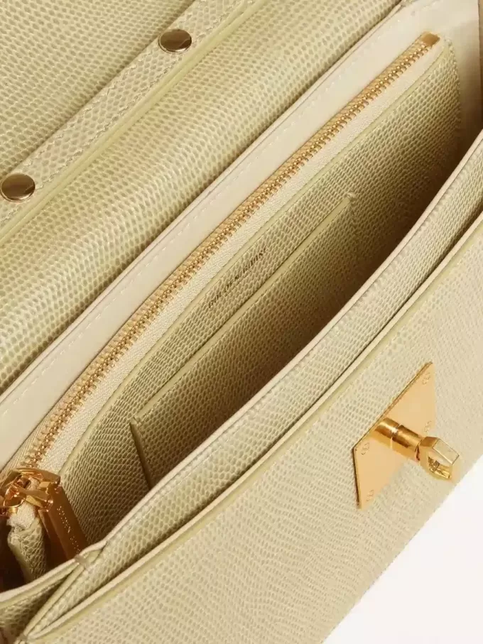 Bolso Gioia en piel de oveja gris mineral con detalles dorados Bolso Gioia en piel de oveja gris mineral con detalles dorados