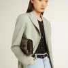 Bolso Gioia en piel negra brillante con detalles metálicos Bolso Gioia en piel negra brillante con detalles metálicos