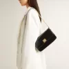 Bolso Gioia en piel negra con detalles dorados Bolso Gioia en piel negra con detalles dorados