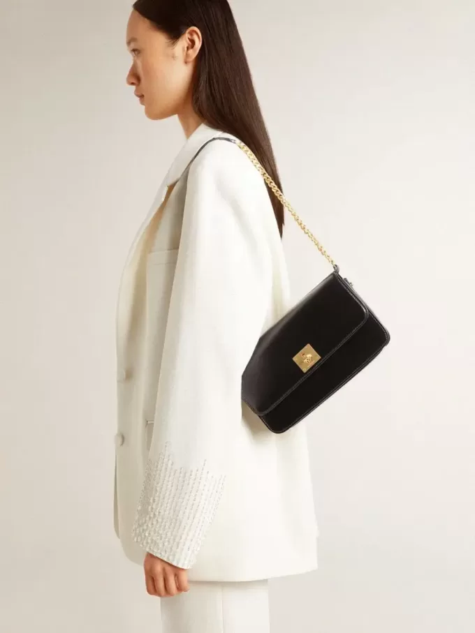 Bolso Gioia en piel negra con detalles dorados Bolso Gioia en piel negra con detalles dorados