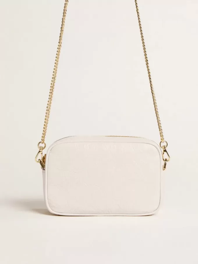 Bolso Mini Star en piel color blanco mantequilla con estrella tono sobre tono