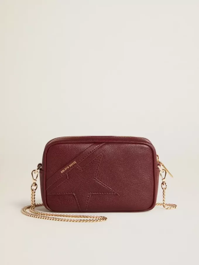 Bolso Mini Star en piel color vino con estrella tono sobre tono