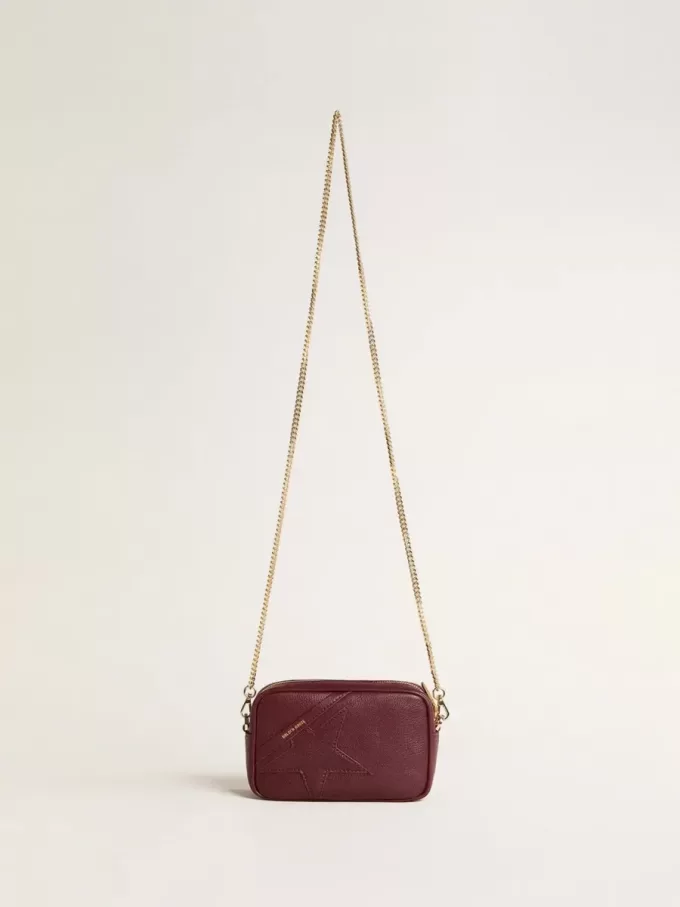 Bolso Mini Star en piel color vino con estrella tono sobre tono