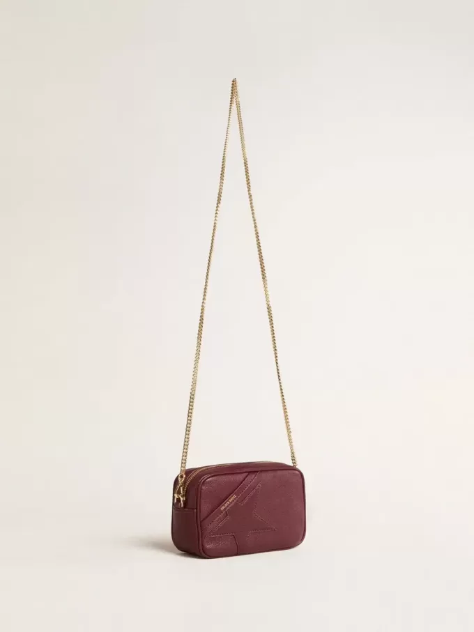 Bolso Mini Star en piel color vino con estrella tono sobre tono