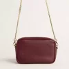 Bolso Mini Star en piel color vino con estrella tono sobre tono