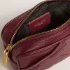 Bolso Mini Star en piel color vino con estrella tono sobre tono
