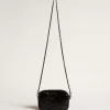 Bolso Mini Star en piel negra con estrella de cristal Swarovski