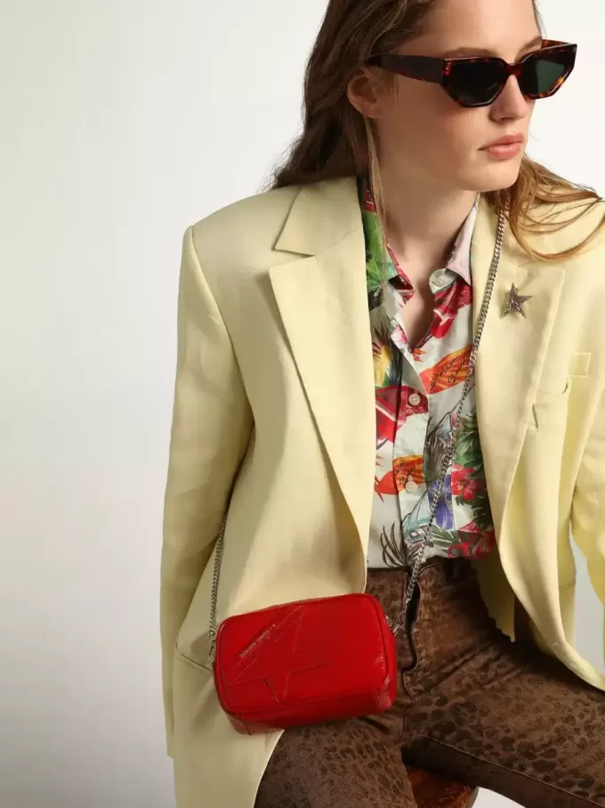 Bolso Mini Star para mujer en piel pintada de color rojo con estrella tono sobre tono