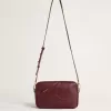 Bolso Star en piel color vino con estrella tono sobre tono Bolso Star en piel color vino con estrella tono sobre tono