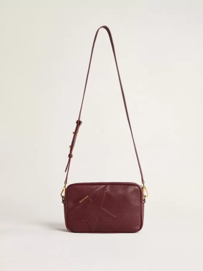 Bolso Star en piel color vino con estrella tono sobre tono Bolso Star en piel color vino con estrella tono sobre tono