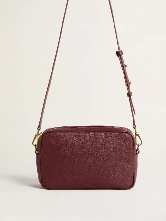 Bolso Star en piel color vino con estrella tono sobre tono Bolso Star en piel color vino con estrella tono sobre tono