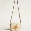 Bolso Star en piel martillada color mantequilla con estrella de cristal Swarovski Bolso Star en piel martillada color mantequilla con estrella de cristal Swarovski