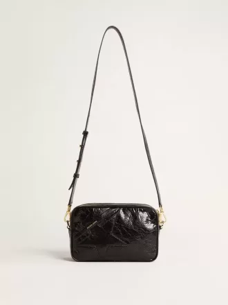 Bolso Star en piel negra brillante con estrella tono sobre tono