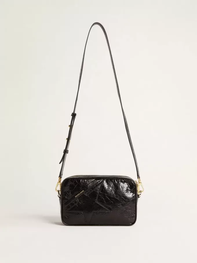 Bolso Star en piel negra brillante con estrella tono sobre tono Bolso Star en piel negra brillante con estrella tono sobre tono