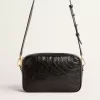 Bolso Star en piel negra brillante con estrella tono sobre tono Bolso Star en piel negra brillante con estrella tono sobre tono