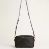 Bolso Star en piel negra con estrella tono sobre tono