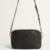 Bolso Star en piel negra con estrella tono sobre tono