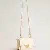 Bolso Venezia en piel acolchada color mantequilla con detalles dorados Bolso Venezia en piel acolchada color mantequilla con detalles dorados