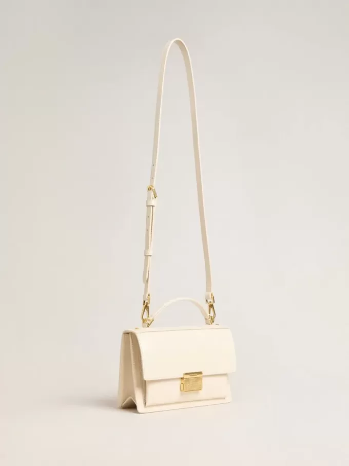 Bolso Venezia en piel acolchada color mantequilla con detalles dorados Bolso Venezia en piel acolchada color mantequilla con detalles dorados