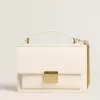 Bolso Venezia en piel acolchada color mantequilla con detalles dorados Bolso Venezia en piel acolchada color mantequilla con detalles dorados