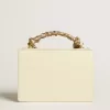 Bolso Venezia en piel acolchada color mantequilla con pañuelo de seda