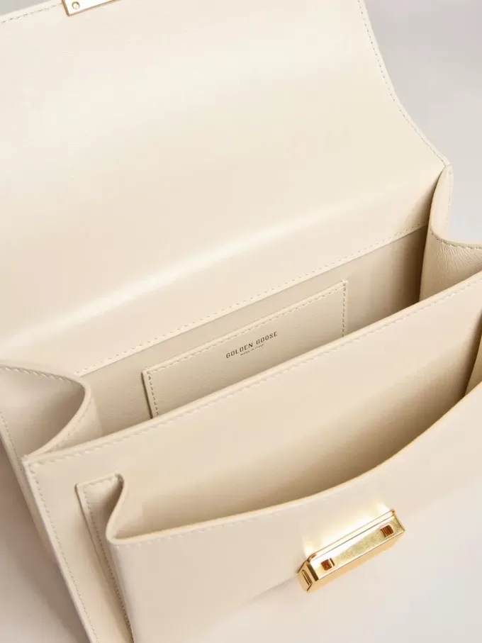 Bolso Venezia en piel acolchada color mantequilla con pañuelo de seda