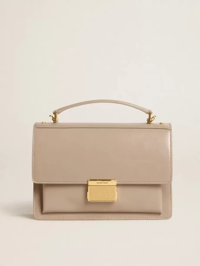 Bolso Venezia en piel beige con ribetes y detalles dorados Bolso Venezia en piel beige con ribetes y detalles dorados