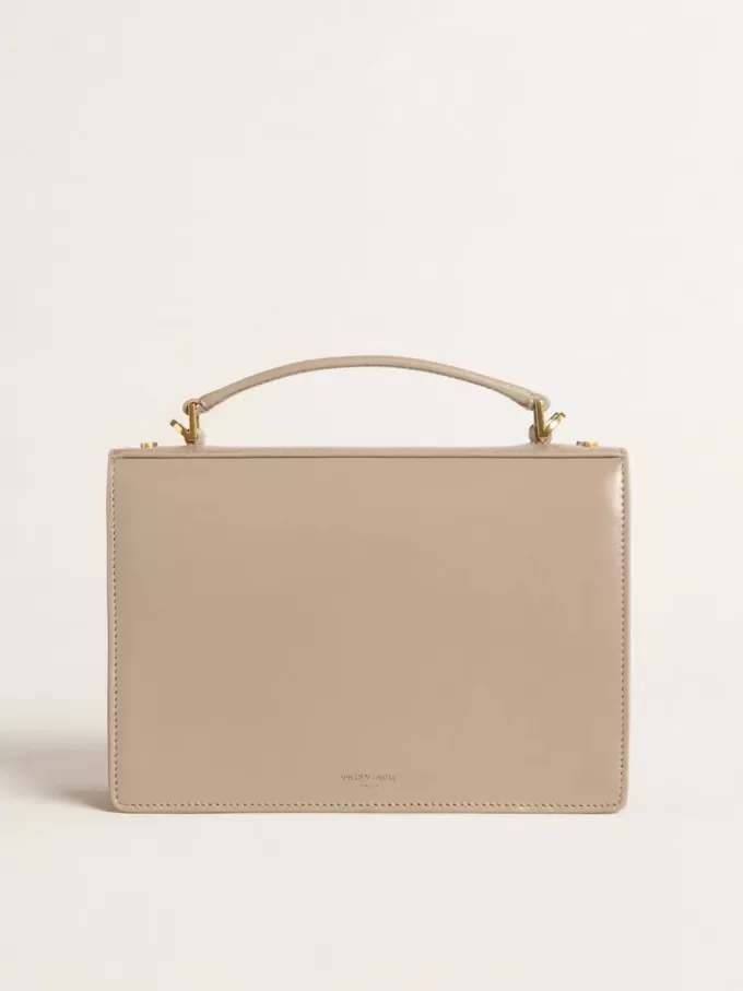 Bolso Venezia en piel beige con ribetes y detalles dorados Bolso Venezia en piel beige con ribetes y detalles dorados
