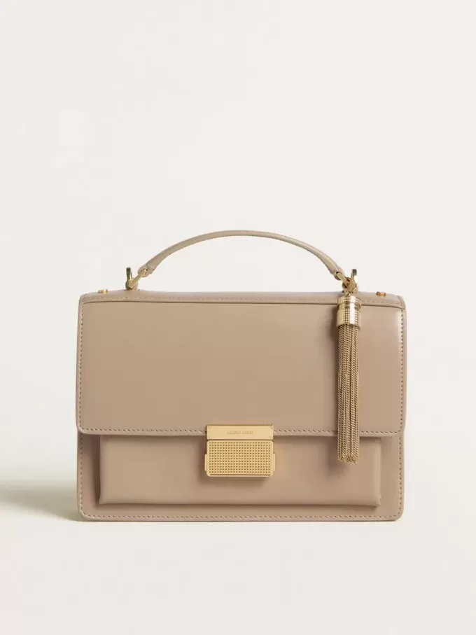 Bolso Venezia en piel beige con ribetes y detalles dorados Bolso Venezia en piel beige con ribetes y detalles dorados