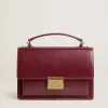 Bolso Venezia en piel bordada burdeos con detalles dorados