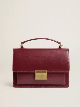 Bolso Venezia en piel bordada burdeos con detalles dorados