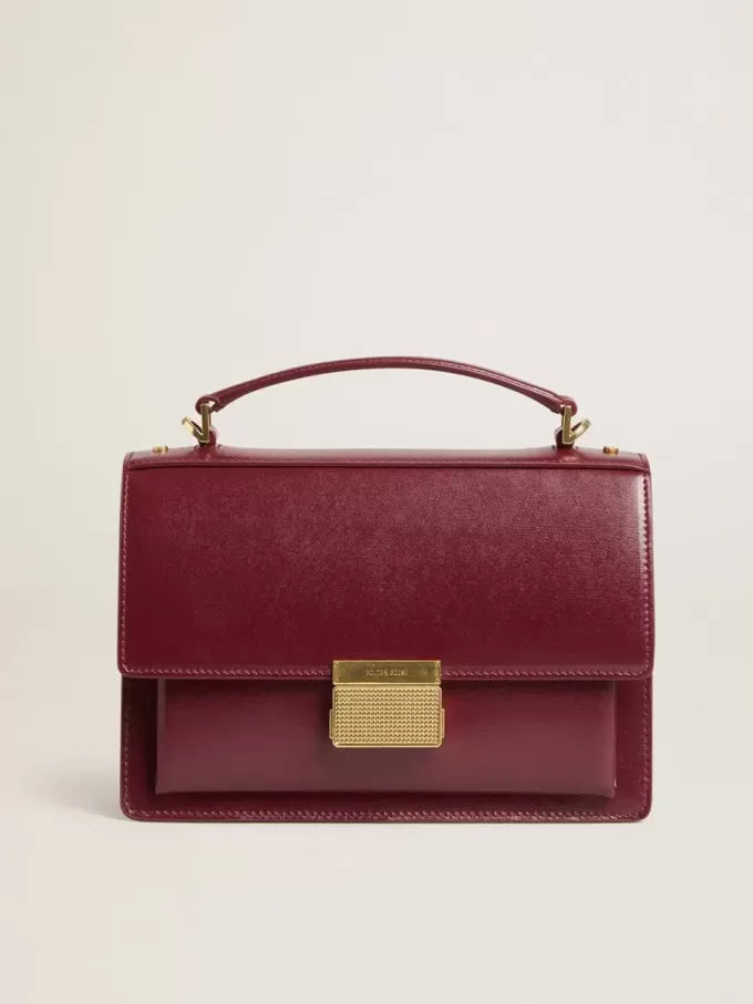 Bolso Venezia en piel bordada burdeos con detalles dorados