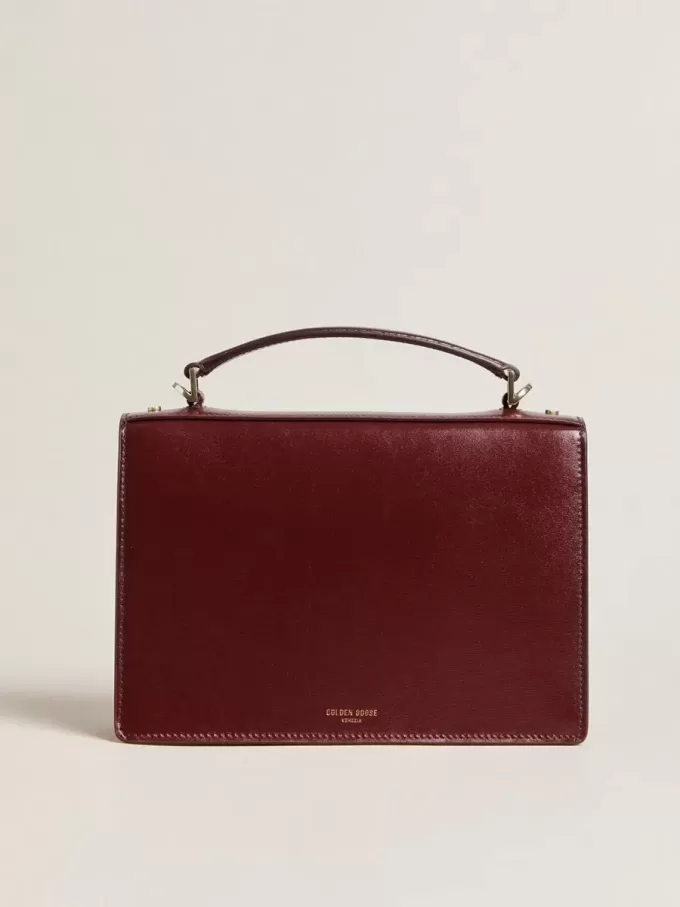 Bolso Venezia en piel bordada burdeos con detalles dorados