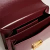 Bolso Venezia en piel bordada burdeos con detalles dorados