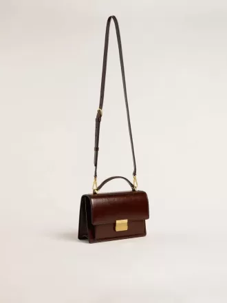Bolso Venezia en piel laminada marrón oscuro con detalles dorados
