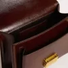 Bolso Venezia en piel laminada marrón oscuro con detalles dorados Bolso Venezia en piel laminada marrón oscuro con detalles dorados