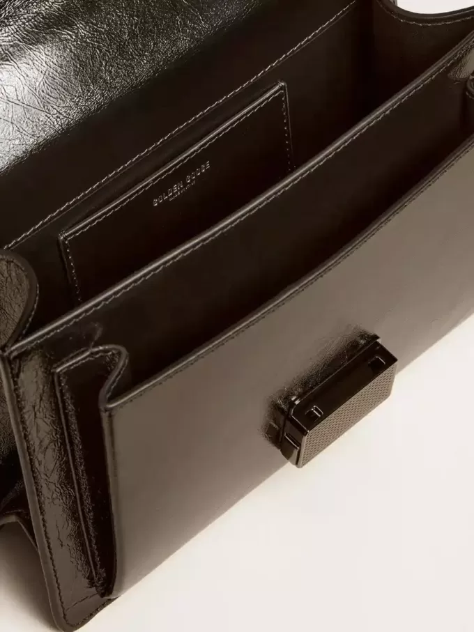 Bolso Venezia en piel metalizada negra con detalles negros Bolso Venezia en piel metalizada negra con detalles negros