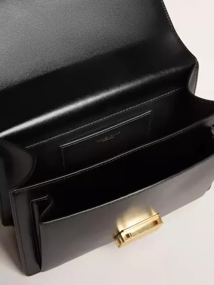 Bolso Venezia en piel negra con detalles dorados Bolso Venezia en piel negra con detalles dorados