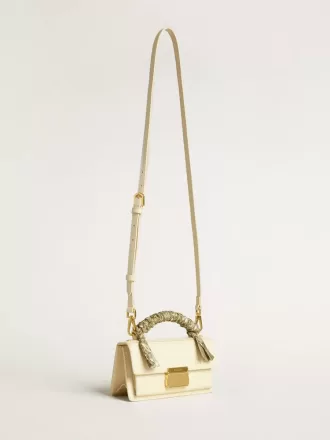 Bolso Venezia pequeño en piel acolchada color mantequilla con pañuelo trenzado.