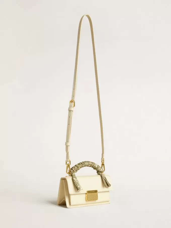 Bolso Venezia pequeño en piel acolchada color mantequilla con pañuelo trenzado. Bolso Venezia pequeño en piel acolchada color mantequilla con pañuelo trenzado.